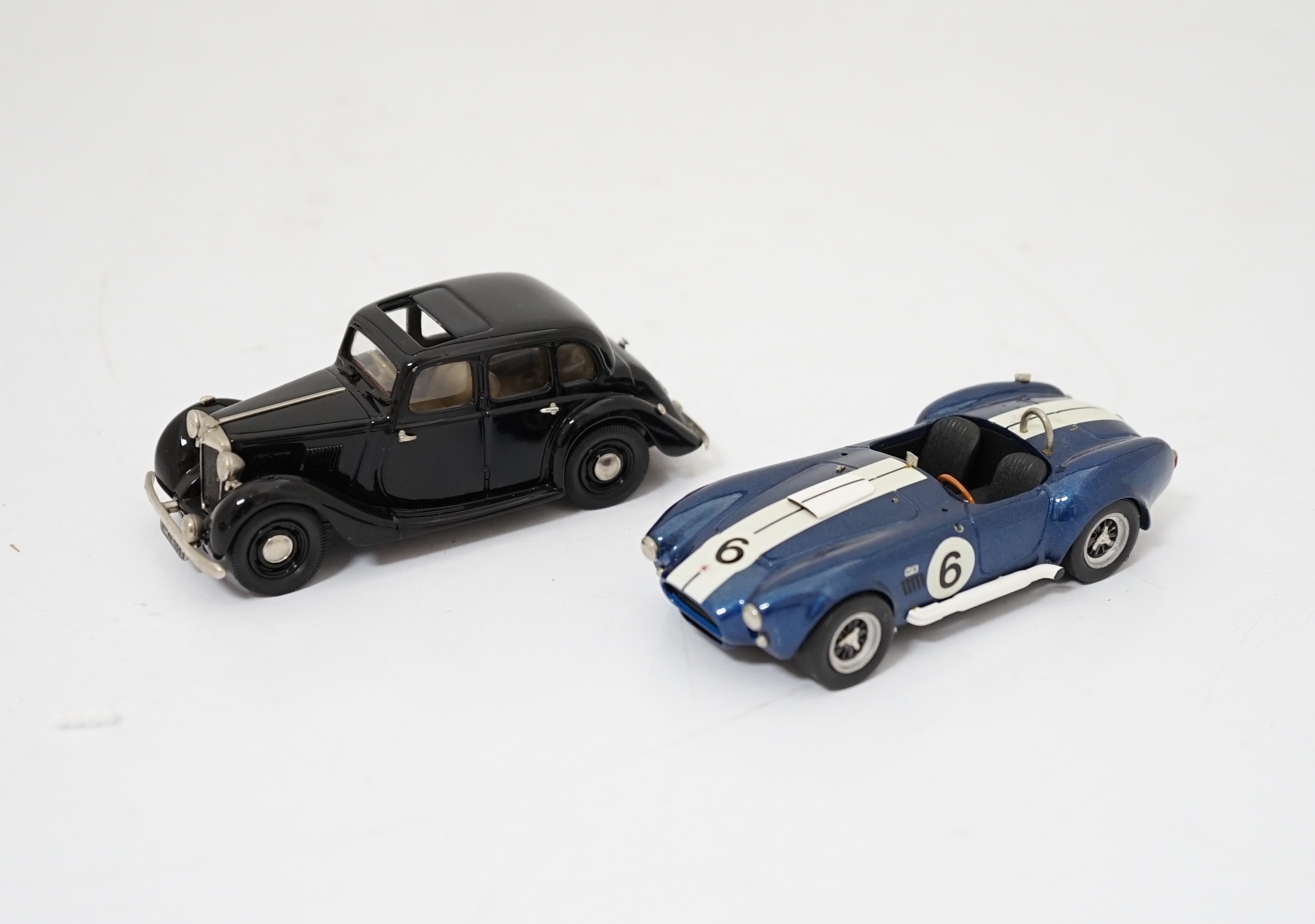 Twenty boxed diecast, white metal, etc. model vehicles including; a Lansdowne Models MG Saloon Type ‘YA’, and an unboxed S.M.T.S. white metal A.C. cobra, two Scalextric cars; a Bentley (C305) and an Alfa-Romeo (C306), th